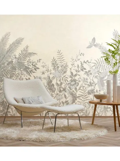 An enchanted garden can be brought indoors with a surreal, monochromatic wallpaper. This design is perfect for creating a serene and sophisticated living space with a touch of whimsy.