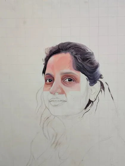 A portrait in progress, showing the careful mapping of facial features. The skin tones are beginning to glow as I add more layers of acrylic paint.