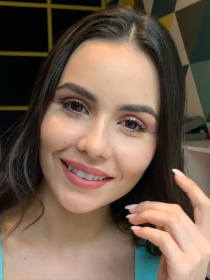 A happy, smiling shot that shows how natural and comfortable the makeup looks. This is key for long e-commerce shoots.