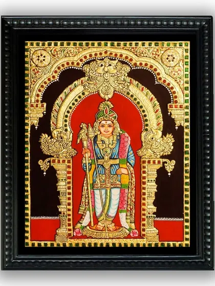 A classic Tanjore painting of a standing Lord Murugan. The rich red background and elaborate gold arch create a traditional and powerful depiction of the deity, perfect for a pooja room.