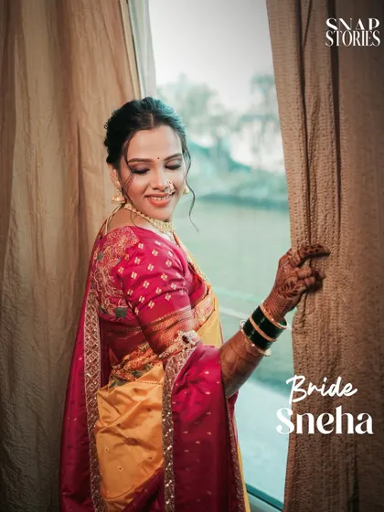A serene bridal portrait by the window, using soft natural light. We find quiet moments to create timeless and elegant photos of the bride.