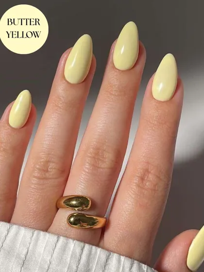 Another must-try summer color is Butter Yellow. This pale, creamy yellow is cheerful and chic, perfect for the sunny season.