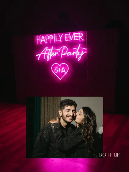 The 'Happily Ever After Party' begins. A fun, custom neon sign is a great way to transition from the formal events to a night of pure party vibes.
