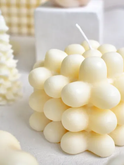 A happy Monday from the studio. Here's a look at our Christmas tree candles and flower-shaped bubble candles.