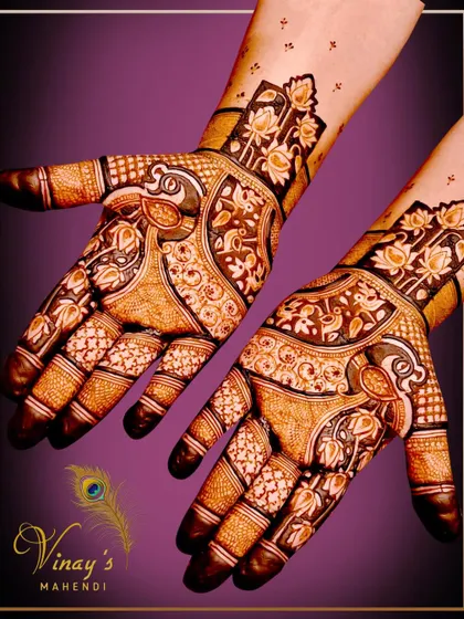 A lovely short-hand design featuring a peacock as the central element, surrounded by intricate floral and vine patterns.