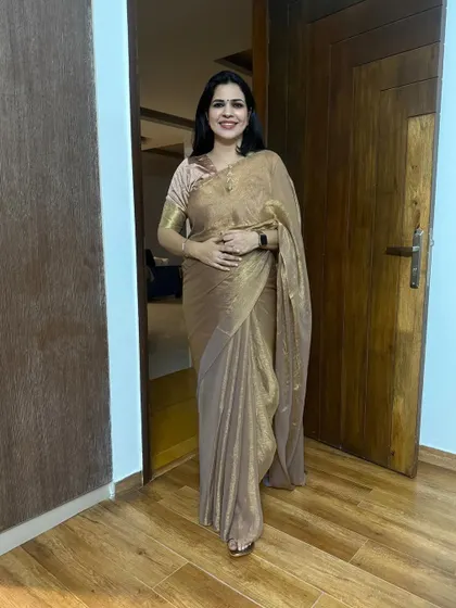 This bronze-gold saree is another one of my affordable finds. The subtle shine makes it look very elegant and perfect for an evening party.
