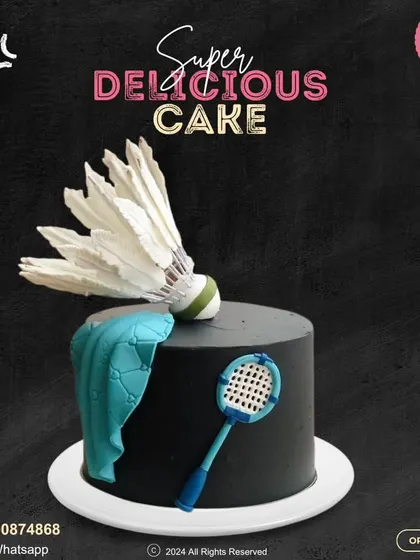 Game, set, match! A perfect cake for a badminton lover. This sleek black cake is decorated with a realistic fondant shuttlecock, racket, and towel, serving up a winning design.