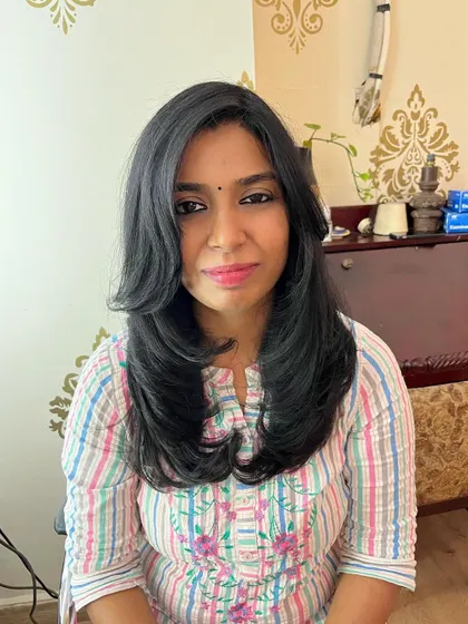 Ramya looking elegant with her new hairstyle.