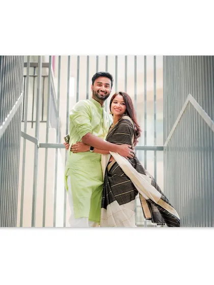 A happy, relaxed portrait of a couple during their anniversary shoot. We love to continue telling your story as your family grows.
