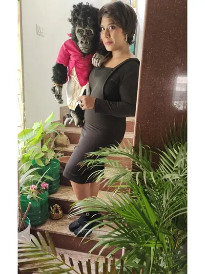 A final shot from our indoor photoshoot, highlighting the close bond between me and my puppet partner, Nikki.