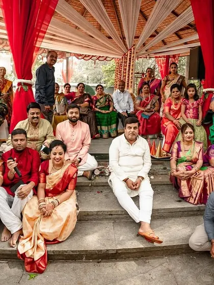 A full family portrait taken on the steps of the mandap. A wonderful memory of all the people who came to celebrate the couple's union.