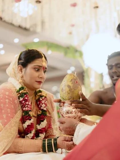 A beautiful moment from the Talambralu ritual, capturing the blend of tradition and happiness in a South Indian wedding.
