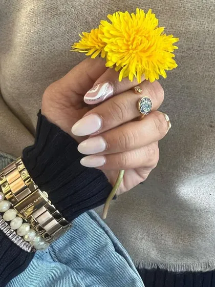 Another gorgeous shot from a happy client. Her chic and subtle nail art looks stunning paired with her stylish accessories.