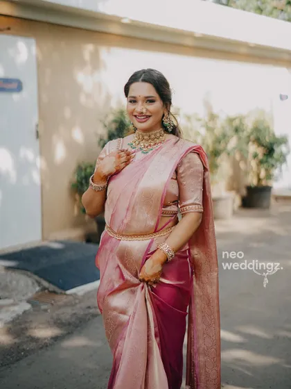 A full length shot showing her complete, elegant engagement look.