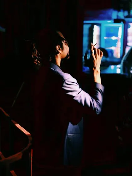 A candid, moody shot taken between sets. Even in the chaos of a club night, I find moments to reset and focus.