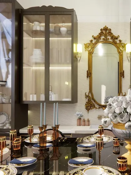 Detail shot of the dining area, showcasing the elegant crockery unit with internal lighting and a stunning rococo-style mirror. Every element is chosen to complement the room's classic and luxurious theme.