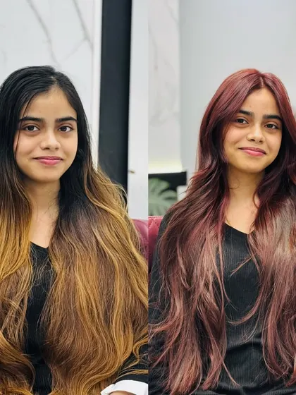 A major change from brassy orange and dark roots to a deep and radiant red-brown mahogany color.