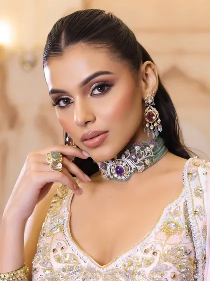 This shot highlights the intricate jewellery and how the soft makeup look allows it to shine.