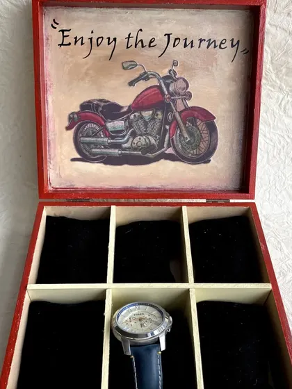 This 6-slot watch box with a vintage motorcycle theme was part of a wedding gift set. The inside is customized with a quote, "Enjoy the Journey."