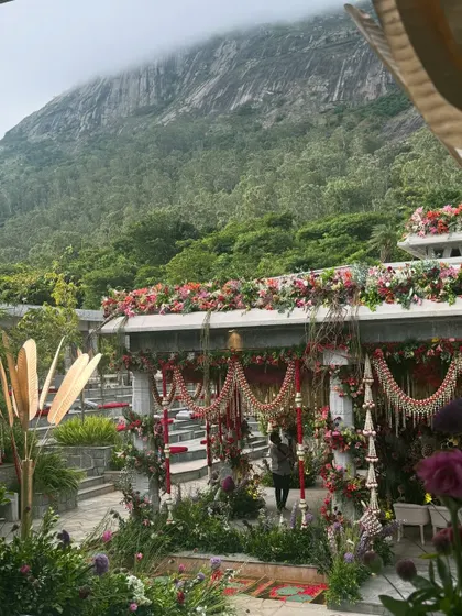 The view from above at this Nandi Hills wedding, just as the ceremony was about to begin. The misty hills in the background added a layer of natural drama to our intricate floral decor, showcasing why Bangalore is an incredible destination wedding location.