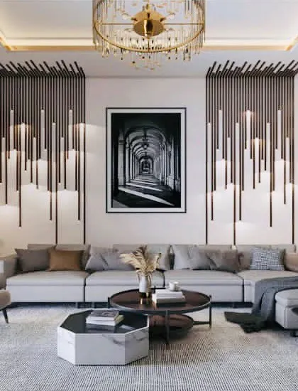 We love making a statement with bold design choices. This living room features dramatic wall accents, a stunning modern chandelier, and a custom coffee bar, all coming together to create a space that is both unique and deeply luxurious.