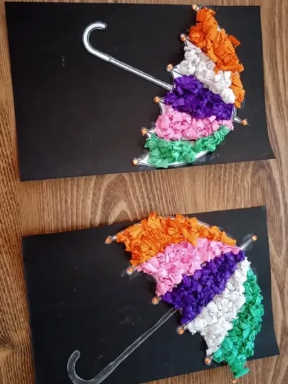 Colorful umbrellas made during our summer camp. This craft uses tissue paper and glue, helping children develop their pincer grasp and an understanding of color blending.