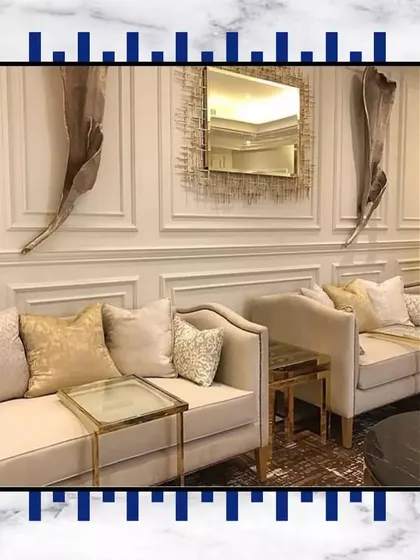 A living room with exotic architecture and reviving colors is the ideal setting for unwinding. This design concept features plush seating and unique wall art to create a truly special space.