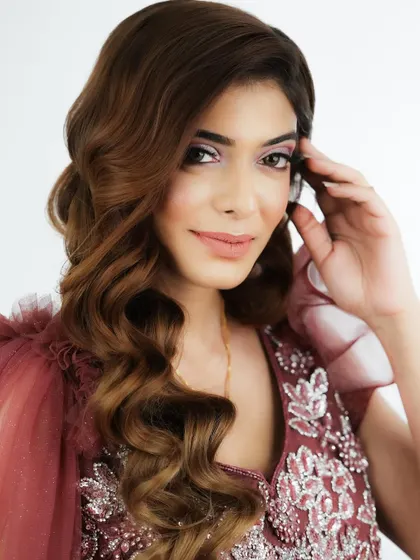 This smiling portrait shows the fresh and youthful vibe of this makeup look.