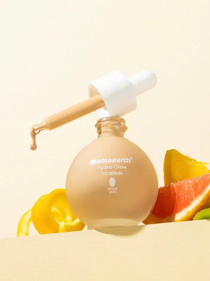 A slightly different angle of our ingredient-focused serum shot. This composition balances the product with fresh grapefruit and lemon peels, creating a beautiful still life that feels both natural and luxurious.