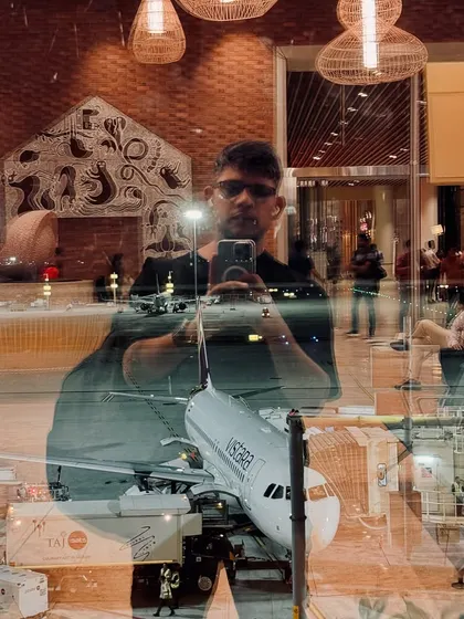 My work takes me to incredible places. This airport selfie captures a moment between flights for a destination wedding, where I performed five shows over two days.