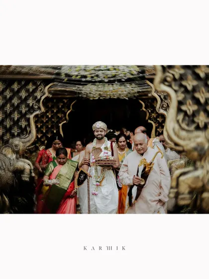 An album-style portrait of the groom making his entrance, with his name elegantly written below.