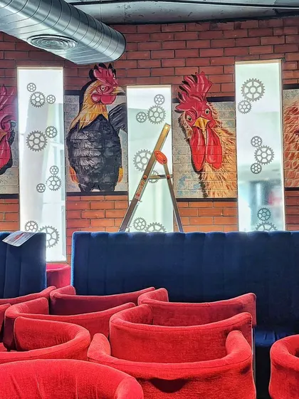 For the restaurant Plan B, we created a series of quirky rooster portraits set against a brick wall, adding to the fun and casual atmosphere.