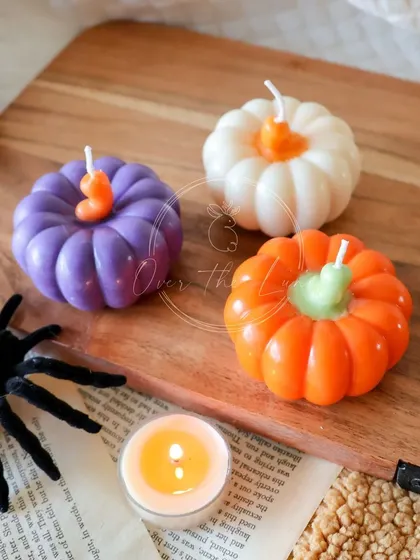 My mini pumpkin candles are perfect for scattering around your home for a touch of autumn charm. They come in a variety of colors.