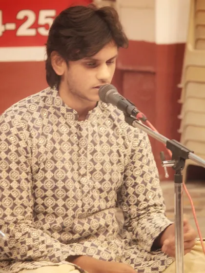 A young artist performing at the 'Swarveni Aradhana', showcasing the talent we nurture at the academy.