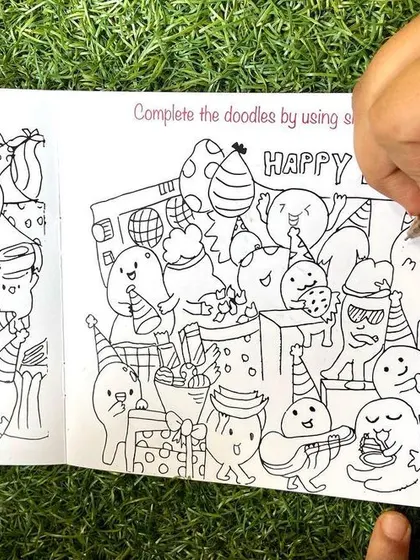 An inside look at the "spot the difference" birthday party scene in the Doodle Book.