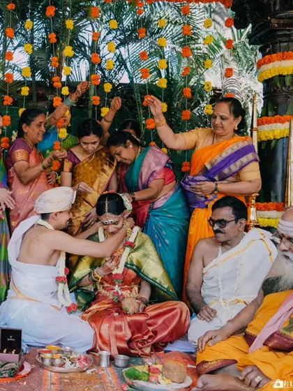 A duplicate of the mangalsutra ceremony with family blessings.