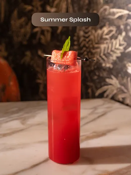 The Summer Splash, a vibrant watermelon cocktail from our Smoke Lab Vodka menu.