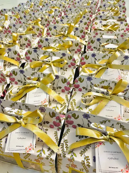 Another view of the floral gift boxes, showing a large order ready for a celebration.