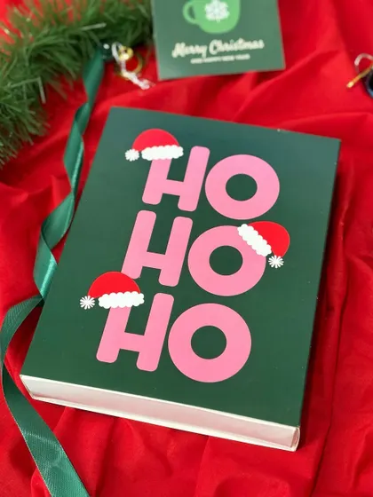 My "Ho Ho Ho" Christmas gift box is designed to bring a smile. The fun and festive packaging makes it a standout choice for personal or corporate holiday gifting.
