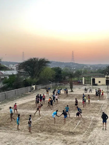 A beautiful sunset over our training ground as the players are busy with their evening practice. This is our home.