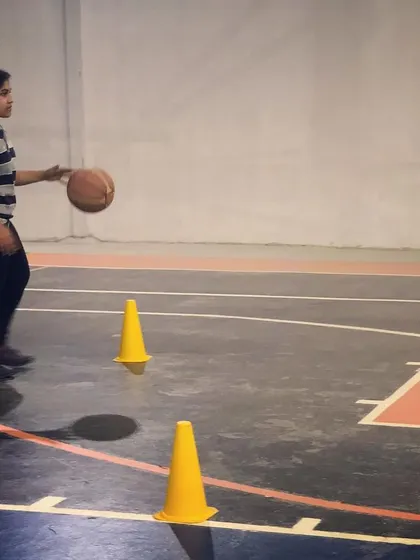 We welcome players of all skill levels. This player is working on her basic dribbling form, building the confidence and control needed to advance her game.