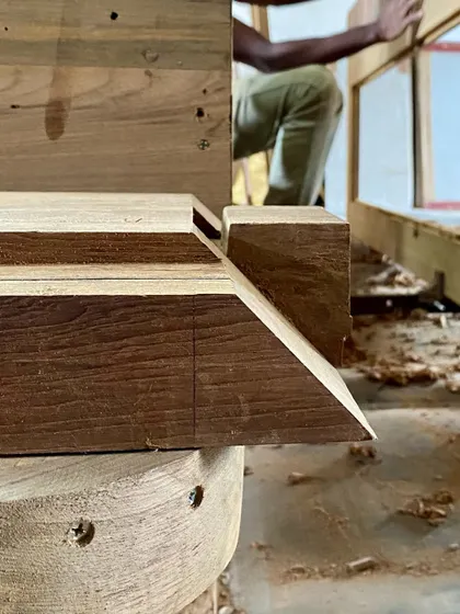 This image highlights the precise wood joinery details used in the home's furniture. We study and test different joints to ensure each piece is strong, durable, and beautifully crafted.