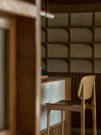 Further images from the BeWell, QBF Coffee, and Tubu projects, illustrating the consistent use of natural materials, clean lines, and thoughtful lighting to create serene and restorative commercial spaces.