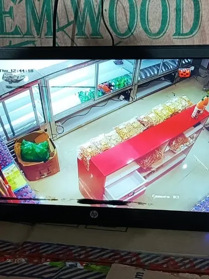 An interior view of a bakery or sweet shop, showing the display counters.
