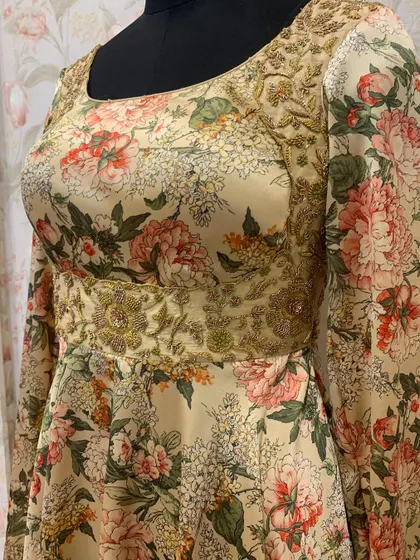 A side view of the floral Anarkali, showing the fit and the flow of the fabric.