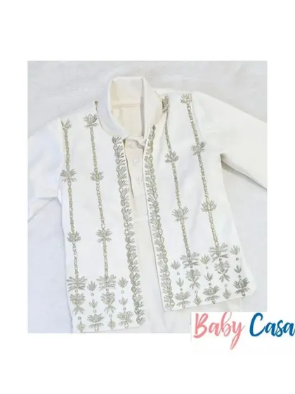 A closer view of our ethnic jumpsuit with its detachable embroidered jacket, showcasing the versatility of our designs.