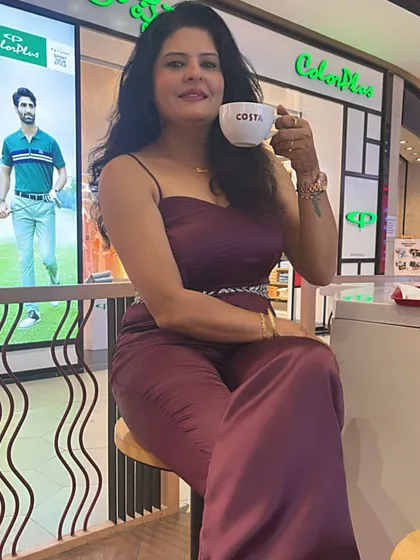 A well-fitted jumpsuit is a modern power outfit. I designed this wine-colored satin jumpsuit with a hand-embroidered belt for a beauty event, showing how to look polished and chic with minimal effort.