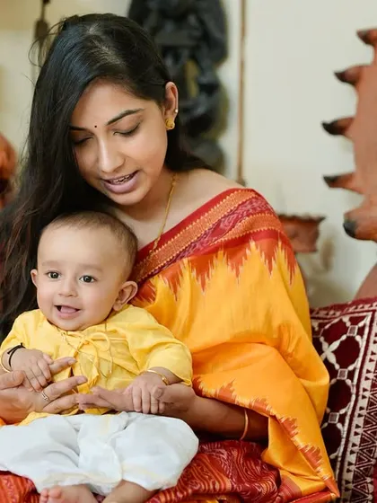 A beautiful portrait of me and my son during his Annaprashan ceremony.