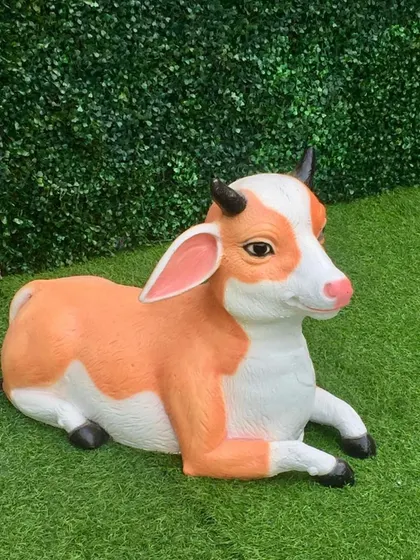 This gentle, sitting calf prop adds another layer of detail and charm to our farm animal collection.