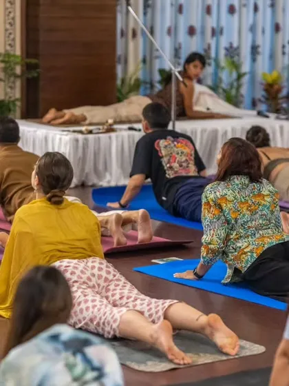 A duplicate image of me leading a class in Bhujangasana. The energy of a group practicing together is truly powerful.